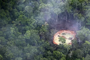 An aerial view shows an illegal mine in the jungle in the south of Venezuela An aerial view shows an illegal mine in the jungle in the south of Venezuela