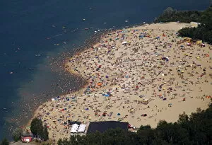 Belgium Collection: An aerial view shows people at a beach on the shores of the Silbersee lake on a hot