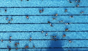 Belgium Collection: An aerial view shows people at a swimming pool on a hot summer day in Haltern