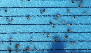 An aerial view shows people at a swimming pool on a hot summer day in Haltern An aerial view shows people at a swimming pool on a hot summer day in Haltern