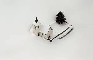 An aerial view shows the snow covered church of the village of Jenisberg near Davos An aerial view shows the snow covered church of the village of Jenisberg near Davos