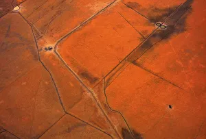 An aerial view of small dams containing water are seen in dry paddocks located north-west An aerial view of small dams containing water are seen in dry paddocks located north-west