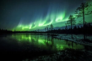 Images Dated 8th October 2018: The Aurora Borealis (Northern Lights) is seen over the sky near Rovaniemi in Lapland