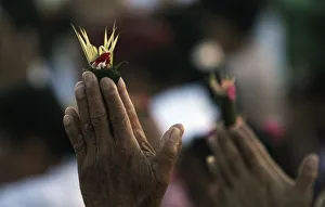 A Balinese Hindu worshiper pray during Tawur Agung ritual ahead of Nyepi at Monumen A Balinese Hindu worshiper pray during Tawur Agung ritual ahead of Nyepi at Monumen