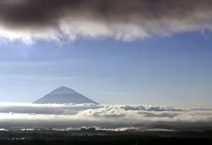 BALIS GUNUNG AGUNG VOLCANO SEEN ABOVE THE CLOUDS IN THE CENTRAL MOUNTAINS BALIS GUNUNG AGUNG VOLCANO SEEN ABOVE THE CLOUDS IN THE CENTRAL MOUNTAINS
