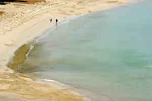 Beach-goers take a stroll on quiet Kamala beach in tsunami-hit Thailands Phuket Beach-goers take a stroll on quiet Kamala beach in tsunami-hit Thailands Phuket