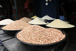 Beans and rice on display for sale are seen inside a shop at a market in Lagos Beans and rice on display for sale are seen inside a shop at a market in Lagos