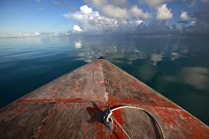 A boat floats in the lagoon near Bikeman islet, located off South Tarawa in the central A boat floats in the lagoon near Bikeman islet, located off South Tarawa in the central