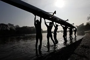 The Cambridge University rowing crew prepare for a training session on the River Thames The Cambridge University rowing crew prepare for a training session on the River Thames