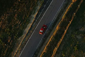 A car travels on a road near Donana Natural Reserve, southwest Spain A car travels on a road near Donana Natural Reserve, southwest Spain