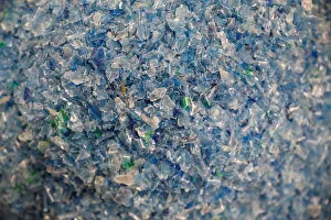 Chips made from recycled plastic bottles are seen before being processed at the Weeco Chips made from recycled plastic bottles are seen before being processed at the Weeco