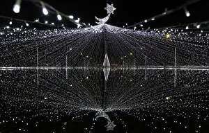 Christmas decorations are seen in front of a pond ahead of Christmas day celebrations in Christmas decorations are seen in front of a pond ahead of Christmas day celebrations in