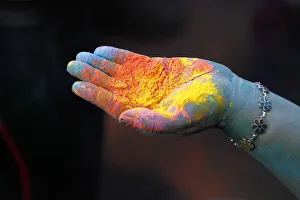 Coloured powder is seen in a participants hand during The Color Run in Caracas Coloured powder is seen in a participants hand during The Color Run in Caracas