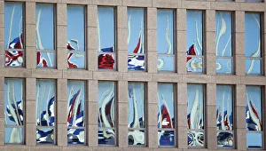 Cuban flags are reflected of the windows of the Interests Section Office of the United Cuban flags are reflected of the windows of the Interests Section Office of the United