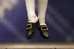 A dancers jumps in a heat during the All Scotland Championships in Irish Dancing at A dancers jumps in a heat during the All Scotland Championships in Irish Dancing at