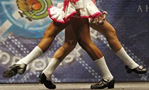 Two dancers pass each other as they compete in a heat during the All Scotland Championships Two dancers pass each other as they compete in a heat during the All Scotland Championships