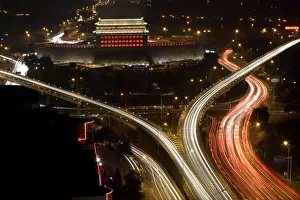 The Deshengmen Embrasure Watchtower is lit by coloured lights in Beijing The Deshengmen Embrasure Watchtower is lit by coloured lights in Beijing