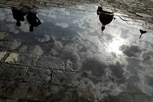 Domes of a hotel are reflected in a puddle of rain water in Mumbai Domes of a hotel are reflected in a puddle of rain water in Mumbai