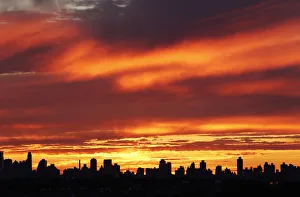 The evening sky is pictured during sunset over New York city The evening sky is pictured during sunset over New York city