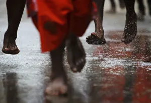 The feet of Hindu devotees are seen as they take part in a Bol Bom pilgrimage in The feet of Hindu devotees are seen as they take part in a Bol Bom pilgrimage in