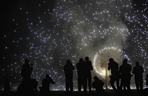 Fire crackers are set-off before effigies of 10-headed demon King Ravana Fire crackers are set-off before effigies of 10-headed demon King Ravana