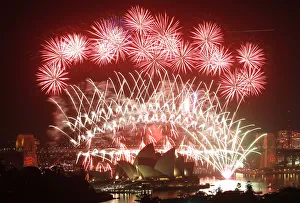 Fireworks explode over the Sydney Harbour Bridge and Opera House during a pyrotechnic Fireworks explode over the Sydney Harbour Bridge and Opera House during a pyrotechnic