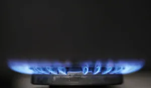 Gas flames are seen burning on a cooker in London Gas flames are seen burning on a cooker in London