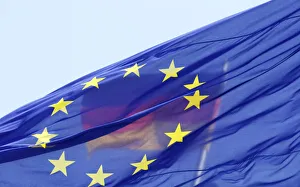 The German national flag is seen behind the EU flag up atop the Reichstag building The German national flag is seen behind the EU flag up atop the Reichstag building
