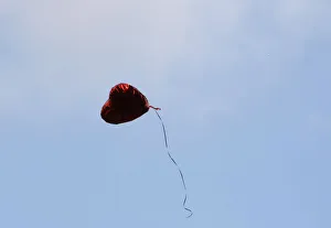 A heart-shaped balloon floats upward during the Seventh Anniversary September 11 A heart-shaped balloon floats upward during the Seventh Anniversary September 11