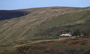 A house is seen on a mountainside in Largs, Scotland A house is seen on a mountainside in Largs, Scotland