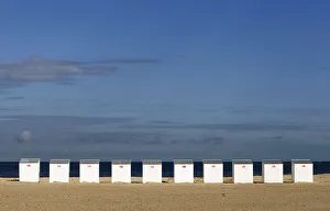 Houses that can be rented by beachgoers are seen on the beach in the coastal town Houses that can be rented by beachgoers are seen on the beach in the coastal town