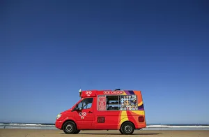 An ice cream vendor waits for business on Portstewart Strand beach An ice cream vendor waits for business on Portstewart Strand beach