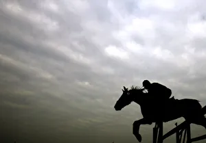 An Indian horse rider jumps an obstacle during a horse show in Kolkata An Indian horse rider jumps an obstacle during a horse show in Kolkata
