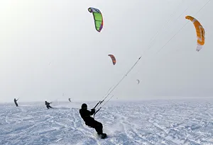 Kite surfers take advantage of the frozen Puck Bay in Chalupy Kite surfers take advantage of the frozen Puck Bay in Chalupy