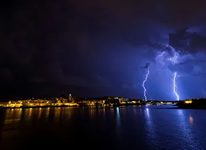 Lightning bolts are seen during a storm over Valletta Lightning bolts are seen during a storm over Valletta