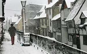 Man braves wintry conditions in Old Hastings in Sussex southern England Man braves wintry conditions in Old Hastings in Sussex southern England