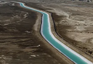A man-made channel is seen in this aerial view along the shores of the Dead Sea A man-made channel is seen in this aerial view along the shores of the Dead Sea
