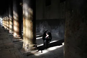 A man prays inside the Church of the Nativity in West Bank town of Bethlehem A man prays inside the Church of the Nativity in West Bank town of Bethlehem