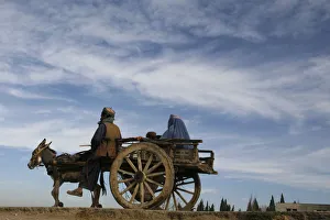 A man rides a cart led by a donkey through the outskirts of Quetta A man rides a cart led by a donkey through the outskirts of Quetta
