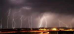 Images Dated 1st July 2015: Mass lightning bolts light up night skies by Daggett airport