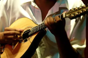 A member of Choros Scenarium group plays a Mamdolin guitar at Scenarium bar in Rio de Janeiro A member of Choros Scenarium group plays a Mamdolin guitar at Scenarium bar in Rio de Janeiro