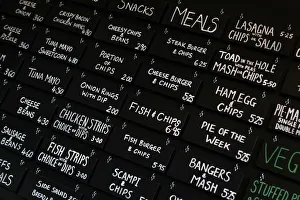 The menu board is seen inside the Little Driver pub in east London The menu board is seen inside the Little Driver pub in east London