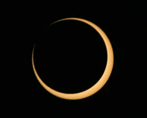 The moon passes between the sun and the earth during an annular solar eclipse over The moon passes between the sun and the earth during an annular solar eclipse over