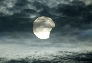 The moon passes between the sun and the earth during a solar eclipse in Amman The moon passes between the sun and the earth during a solar eclipse in Amman