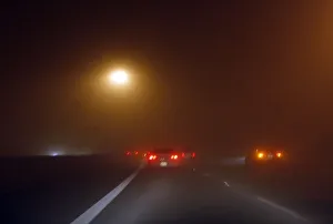 Motorists drive along Arizona State Highway 51 during a dust storm in Phoenix Motorists drive along Arizona State Highway 51 during a dust storm in Phoenix