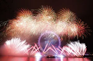 New Years fireworks explode around the London Eye in central London New Years fireworks explode around the London Eye in central London