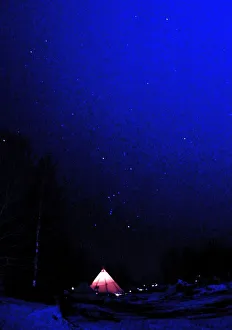 Norwegians sit next to their tent after the first day of the Ski-Flying World Norwegians sit next to their tent after the first day of the Ski-Flying World
