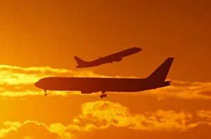 Passenger planes land and take off at Sydney airport Passenger planes land and take off at Sydney airport