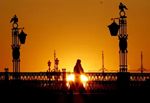 A person walks across a bridge in central St Petersburg A person walks across a bridge in central St Petersburg