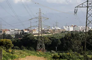 Power lines connecting pylons of high-tension electricity are seen in Algiers Power lines connecting pylons of high-tension electricity are seen in Algiers